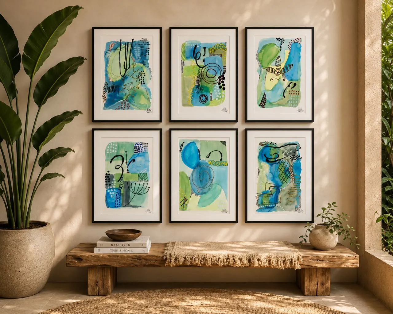 Seis obras de la serie verde sobre un banco de madera
